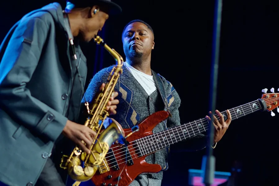 Jose Sax and bassist performing