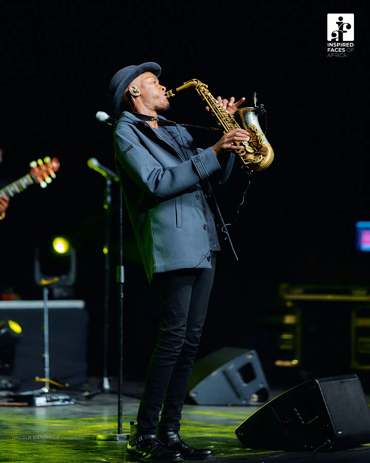 Jose Sax performing alto saxophone on stage