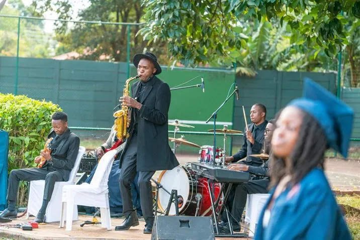 Jose Sax with his band at a graduation celebration
